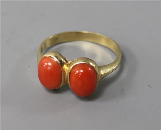A 14ct gold and double coral bead set ring, size S.